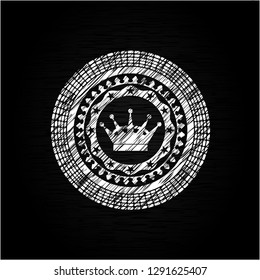 queen crown icon inside chalkboard emblem on black board