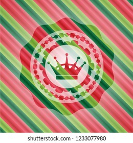 queen crown icon inside christmas colors style badge.