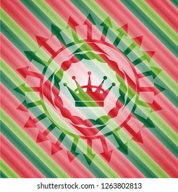 queen crown icon inside christmas colors badge.