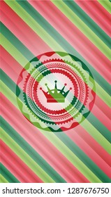 queen crown icon inside christmas colors style badge.