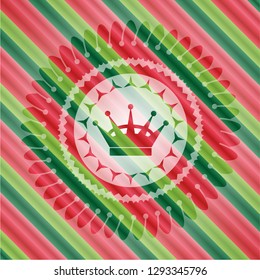queen crown icon inside christmas colors badge.