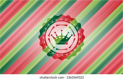 queen crown icon inside christmas badge.