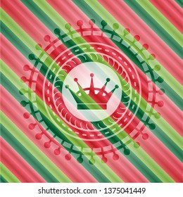 queen crown icon inside christmas badge.