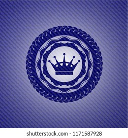 queen crown icon inside emblem with denim texture