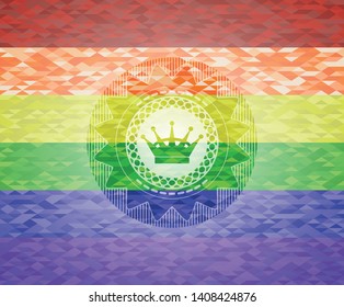 queen crown icon inside emblem on mosaic background with the colors of the LGBT flag