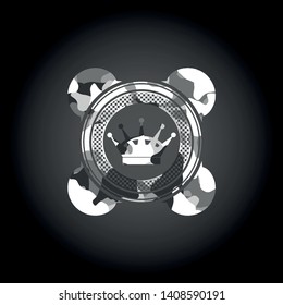 queen crown icon inside grey camo emblem