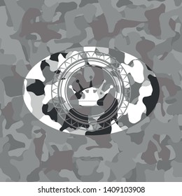 queen crown icon inside grey camouflage emblem