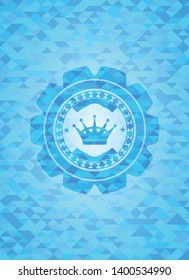 queen crown icon inside light blue emblem with mosaic background