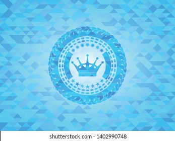 queen crown icon inside light blue mosaic emblem
