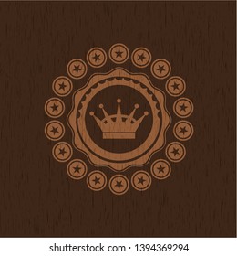 queen crown icon inside realistic wood emblem