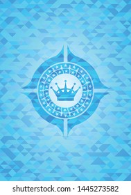 queen crown icon inside realistic light blue mosaic emblem