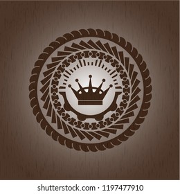 queen crown icon inside retro wood emblem