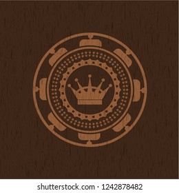 queen crown icon inside retro wood emblem