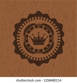 queen crown icon inside retro wood emblem