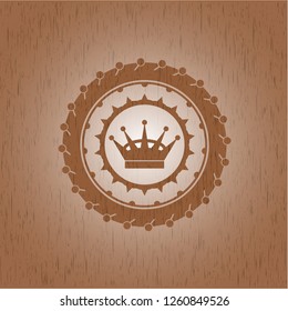 queen crown icon inside retro wooden emblem
