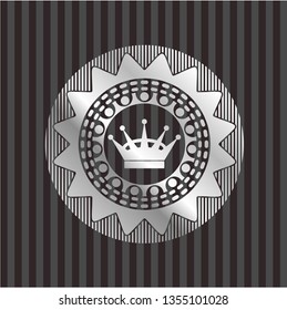 queen crown icon inside silver badge or emblem