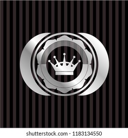 queen crown icon inside silvery badge or emblem