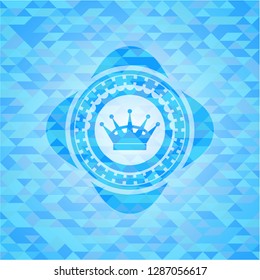 queen crown icon inside sky blue emblem. Mosaic background