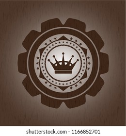 queen crown icon inside vintage wooden emblem