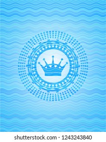 queen crown icon inside water representation style badge.