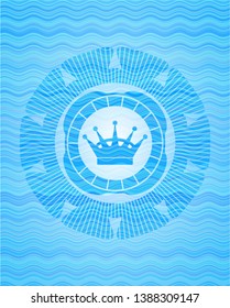 queen crown icon inside water representation style emblem.