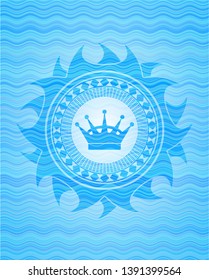 queen crown icon inside water wave concept style badge.