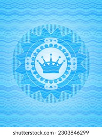queen crown icon inside water emblem. 