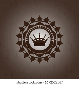 queen crown icon inside wooden emblem. Retro