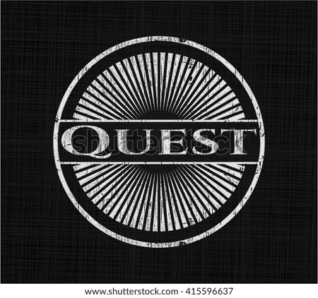 Quest chalkboard emblem on black board