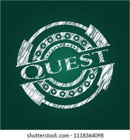 Quest written on a blackboard