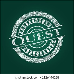 Quest written on a blackboard
