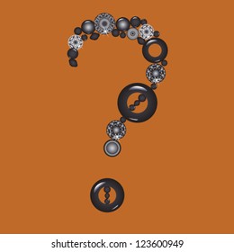 Question mark from beads on brown background