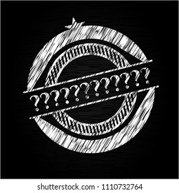Question Mark chalkboard emblem written on a blackboard