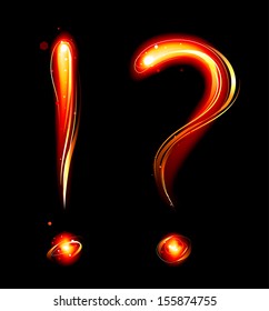 Question mark and exclamation mark from fire on dark background.