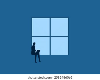 Quiet concentration, focus on work, businessman working on laptop at the window