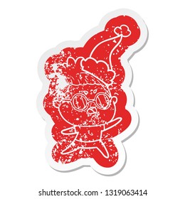 quirky cartoon distressed sticker of a annoyed woman wearing santa hat