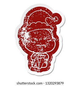 quirky cartoon distressed sticker of a annoyed old lady wearing santa hat