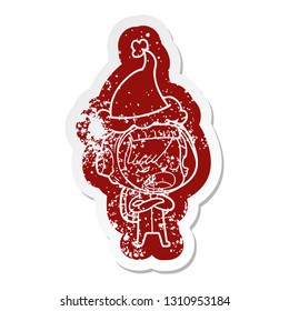 quirky cartoon distressed sticker of a astronaut woman explaining wearing santa hat