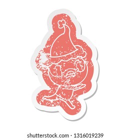 quirky cartoon distressed sticker of a bearded man crying wearing santa hat