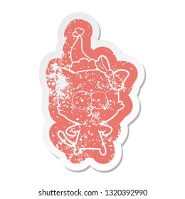 quirky cartoon distressed sticker of a cat wearing santa hat