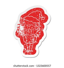 quirky cartoon distressed sticker of a crying man wearing santa hat