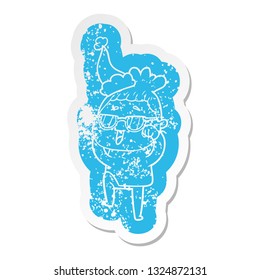 quirky cartoon distressed sticker of a happy woman wearing spectacles wearing santa hat