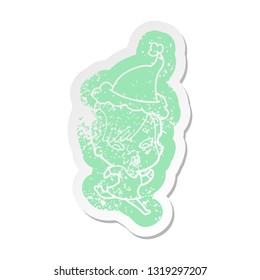 quirky cartoon distressed sticker of a surprised girl wearing santa hat