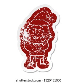 quirky cartoon distressed sticker of a tired bald man wearing santa hat