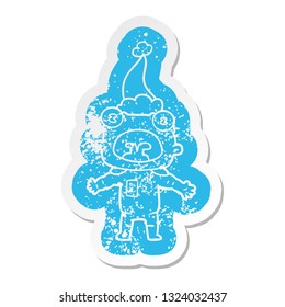 quirky cartoon distressed sticker of a weird alien communicating wearing santa hat