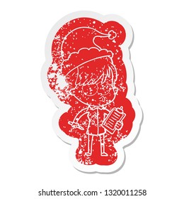 quirky cartoon distressed sticker of a woman wearing santa hat