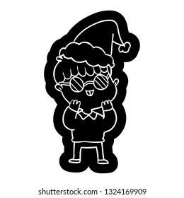 quirky cartoon icon of a boy wearing spectacles wearing santa hat