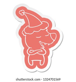 quirky cartoon  sticker of a bear wearing santa hat