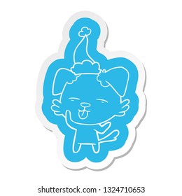 quirky cartoon  sticker of a dog sticking out tongue wearing santa hat