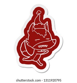 quirky cartoon  sticker of a wolf showing teeth wearing santa hat